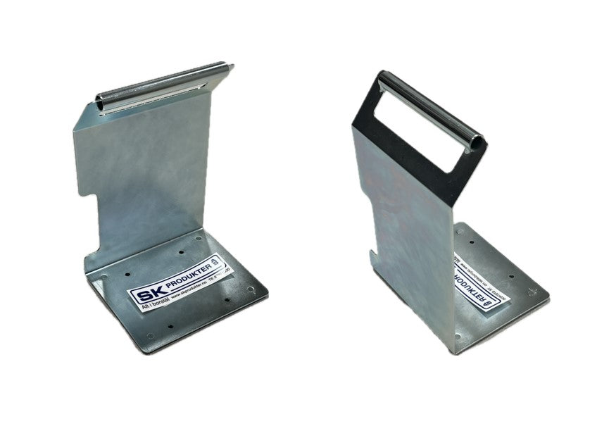 Universellt lyfthandtag/fäste för transport av pumpar